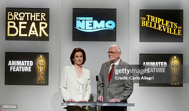 Actress Sigourney Weaver and Frank Pierson, President of the Acadamy of Motion Picture Arts and Sciences read the list of nominees for Best Animated...