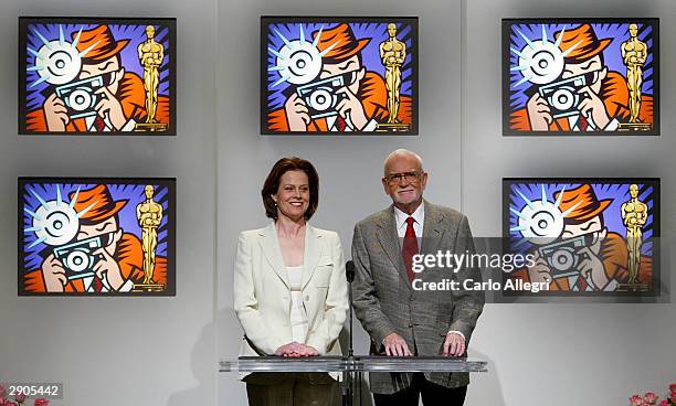 Actress Sigourney Weaver and Frank Pierson, President of the Acadamy of Motion Picture Arts and Sciences prepare to present nominees at the...
