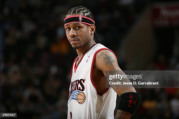 Allen Iverson of the Philadelphia 76ers stands on the court during a game against the New Jersey Nets at Wachovia Center on January 9, 2004 in...