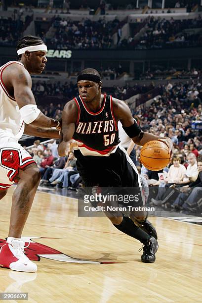 Zach Randolph of the Portland Trail Blazers drives to the hoop against Eddy Curry of the Chicago Bulls during the game at the United Center on...