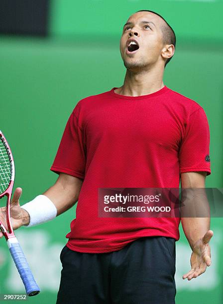 Hicham Arazi of Morocco reacts during his men's singles quarter-final match against Juan Carlos Ferrero of Spain at the Australian Open in Melbourne,...