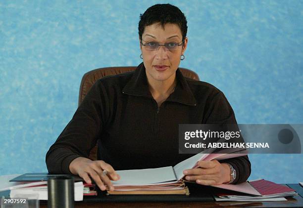 Asma Chaabi, the first and only woman mayor in Morocco, poses in her office, 27 January 2004 in her town of Essaouira, southern Morocco. The Moroccan...