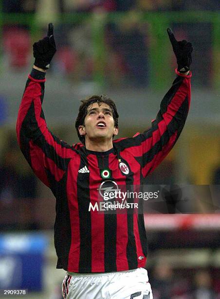 Milan's Kaka of Brazil celebrates after scoring against Siena during their Serie A soccer match at Milan's San Siro stadium 28 January 2004. AFP...