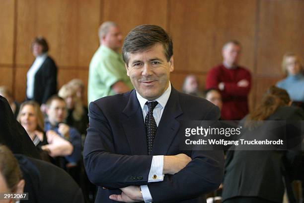 Deutsche Bank CEO Josef Ackermann waits in the courtroom for the beginning of the fourth session of his trial January 29, 2004 in Duesseldorf,...