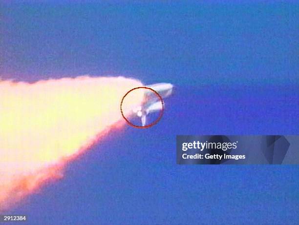 In this image from video, an object is visible falling from the Space Shuttle Columbia during liftoff on January 16, 2003 from the Kennedy Space...