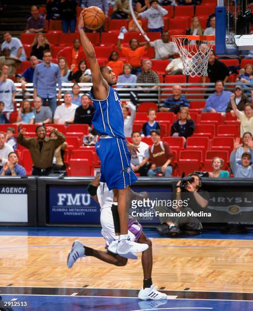 Tracy McGrady of the Orlando Magic goes up with the ball during the NBA game against the Milwaukee Bucks at TD Waterhouse Centre on January 19, 2004...