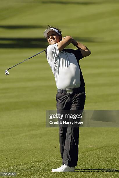 Frederik Jacobson of Sweden hits a shot on the 18th hole during the first round of the Bob Hope Chrysler Classic at Bermuda Dunes Country Club on...