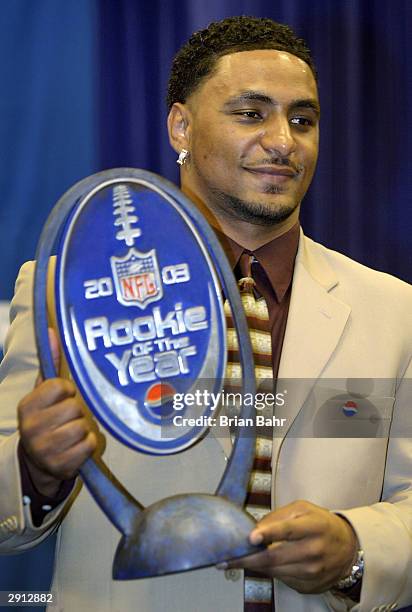 Domanick Davis of the Houston Texans smiles after receiving the 2003 Pepsi NFL Rookie of the Year Award on January 29, 2004 at the Houston Convention...