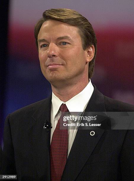 Democratic presidential hopeful John Edwards of North Carolina stands onstage prior to a debate January 29, 2004 in Greenville, South Carolina. With...