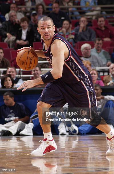 Jason Kidd of the New Jersey Nets drives against the Orlando Magic January 29, 2004 at TD Waterhouse Centre in Orlando, Florida. The Nets won 89-79....