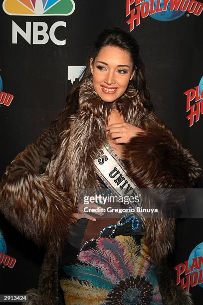 Miss Universe Amelia Vega arrives at "The Apprentice" viewing party on January 29, 2004 at Planet Hollywood, in New York City.