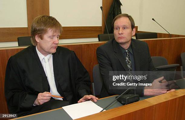 Armin Meiwes , a 42-year-old computer technician and self-confessed cannibal and his lawyer Harald Ermel are seen in court on the last day of his...