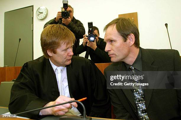 Armin Meiwes , a 42-year-old computer technician and self-confessed cannibal and his lawyer Harald Ermel are seen in court on the last day of his...