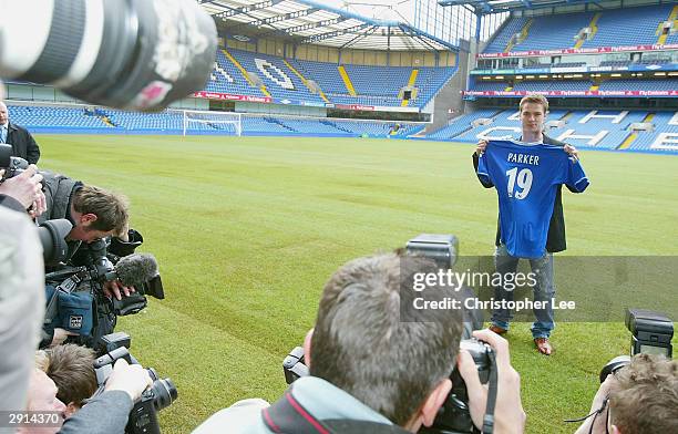 Scott Parker of Chelsea poses for the cameras during a Chelsea FC press conference at Stamford Bridge on January 30 in London. Parker signed from...