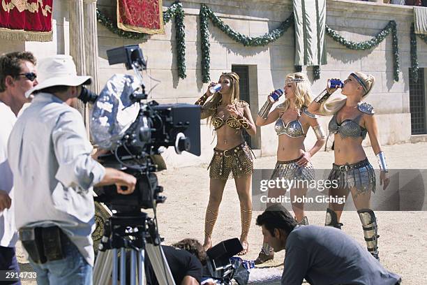Beyonce Knowles, Britney Spears and Pink drink Pepsi during the making of the Pepsi music commercial 'Pepsi Gladiators' in Rome on September 22, 2003...