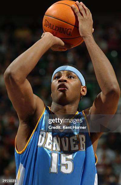 Carmelo Anthony of the Denver Nuggets shoots a free throw during the game against the Utah Jazz on January 20, 2004 at Delta Center in Salt Lake...