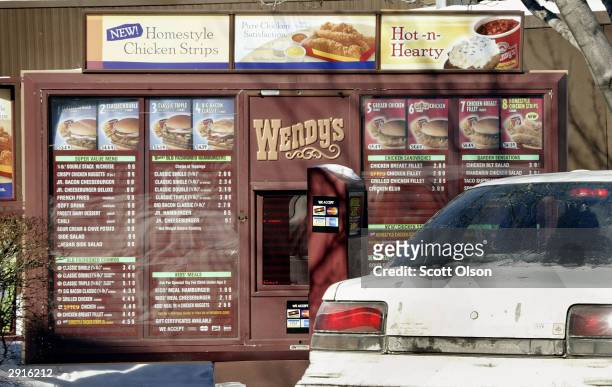 Customer orders from the drive-up menu at a Wendy's restaurant January 30, 2004 in Chicago, Illinois. Wendy's, the nation's third largest hamburger...