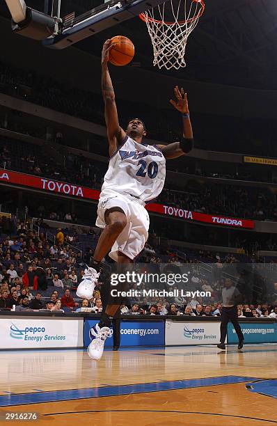 Larry Hughes of the Washington Wizards goes for a layup against the Phoenix Suns January 30, 2004 at the MCI Center in Washington DC. NOTE TO USER:...