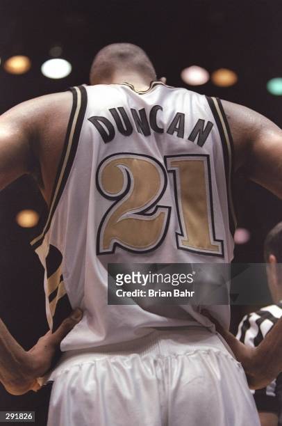 Center Tim Duncan of the Wake Forest Demon Deacons hold his head down a playoff game against the Stanford Cardinals at the McKale Center in Tuscon,...