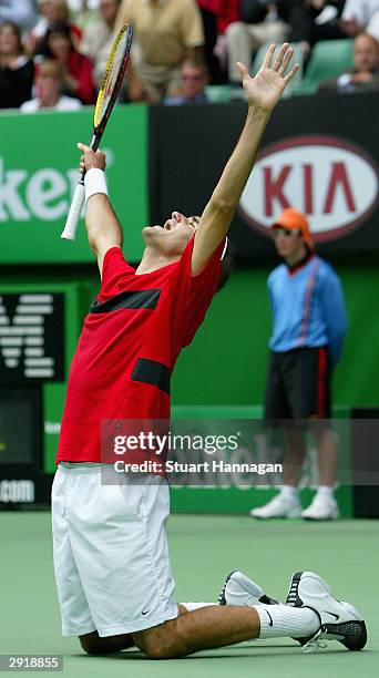 Roger Federer of Switzerland celebrates Championship Point and his victory against Marat Safin of Russia during the Mens Singles Final during day...