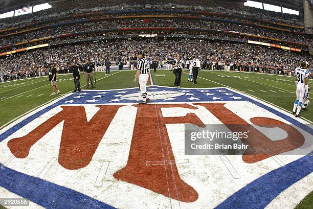 The NFL symbol painted on the 50 yard line prior to the start of Super Bowl XXXVIII between the New England Patriots and the Carolina Panthers at...