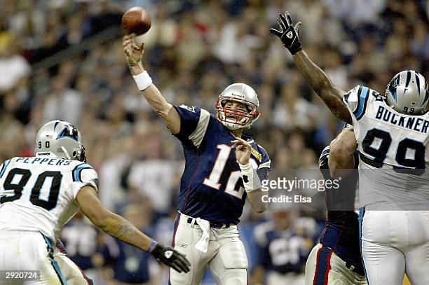 Quarterback Tom Brady of the New England Patriots passes against the Carolina Panthers during the second quarter of Super Bowl XXXVIII at Reliant...