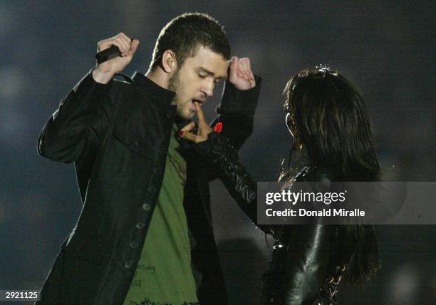 Justin Timberlake performs with Janet Jackson during the halftime show at Super Bowl XXXVIII between the New England Patriots and the Carolina...