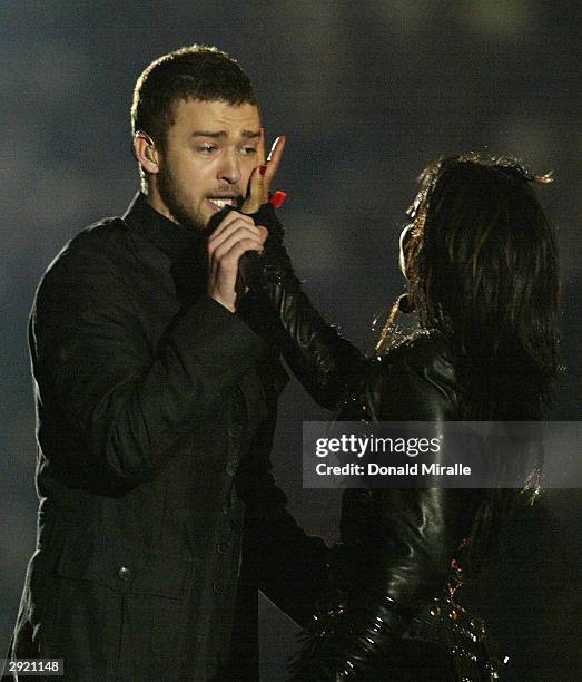 Justin Timberlake performs with Janet Jackson during the halftime show at Super Bowl XXXVIII between the New England Patriots and the Carolina...