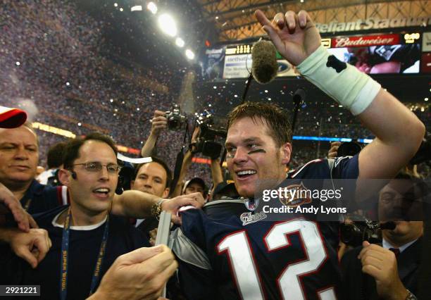 Tom Brady of the New England Patriots celebrates after defeating the Carolina Panthers 32-29 in Super Bowl XXXVIII at Reliant Stadium on February 1,...