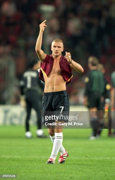 David Beckham of England gestures towards the fans after the European Championships 2000 group match against Portugal at the Philips Stadium in...