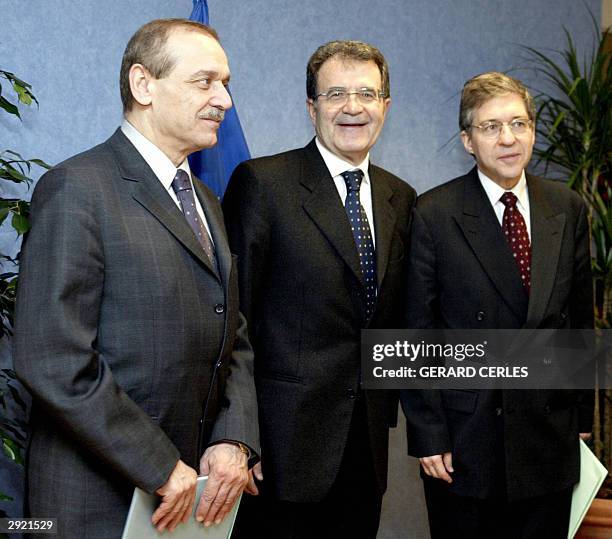 The chairman of the European Commission, Romano Prodi of Italy, poses with the Palestinian chairman of the Geneva Peace Initiative, Yasser Abed Rabbo...