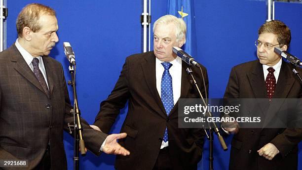 European Commissioner in charge of external relations British Chris Patten , the Palestinian chairman of the Geneva Peace Initiative, Yasser Abed...