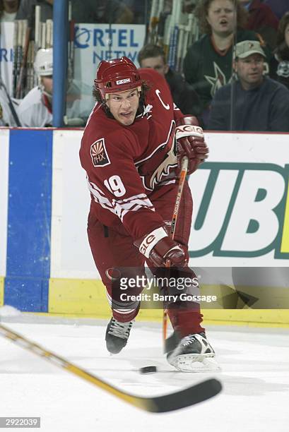 Shane Doan of the Phoenix Coyotes shoots the puck from the point during the game against the Chicago Blackhawks on October 28, 2003 at America West...