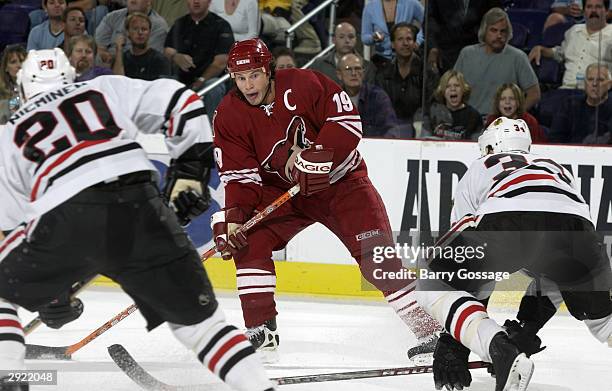 Shane Doan of the Phoenix Coyotes looks to make a play during the game against the Chicago Blackhawks on October 28, 2003 at America West Arena in...