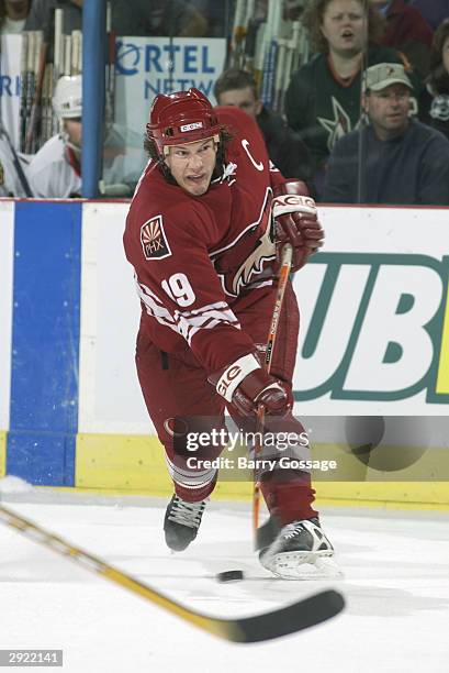 Shane Doan of the Phoenix Coyotes shoots the puck from the point during the game against the Chicago Blackhawks on October 28, 2003 at America West...