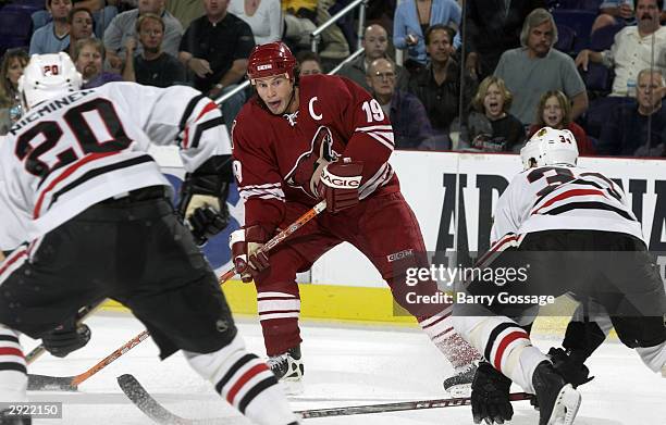 Shane Doan of the Phoenix Coyotes looks to make a play during the game against the Chicago Blackhawks on October 28, 2003 at America West Arena in...