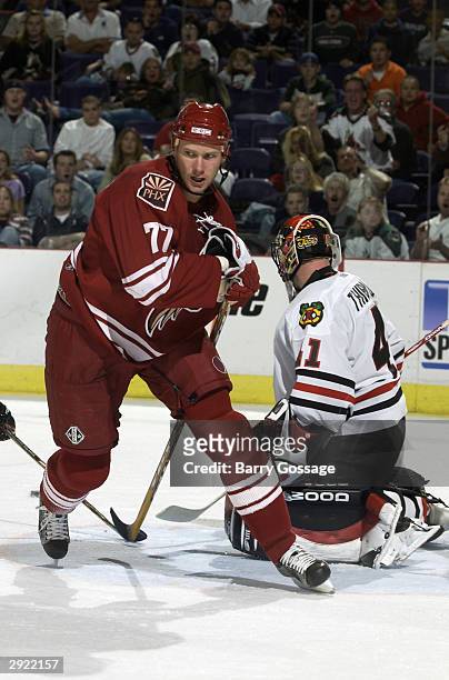 Chris Gratton of the Phoenix Coyotes skates by the goal crease for a deflection during the game against the Chicago Blackhawks on October 28, 2003 at...