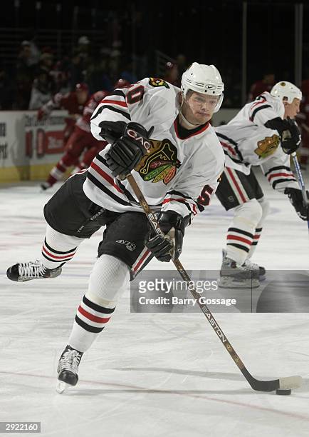 Igor Radulov of the Chicago Blackhawks shoots during warm up prior to taking on the Phoenix Coyotes on October 28, 2003 at America West Arena in...