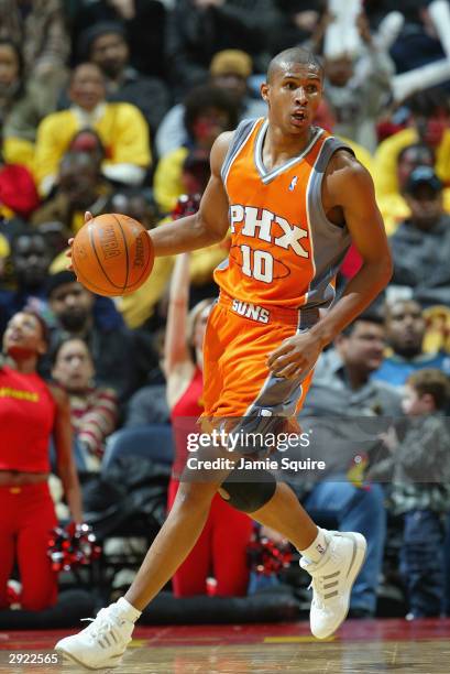 Leandro Barbosa of the Phoenix Suns dribbles the ball against the Atlanta Hawks during the game on January 27, 2004 at Philips Arena in Atlanta,...