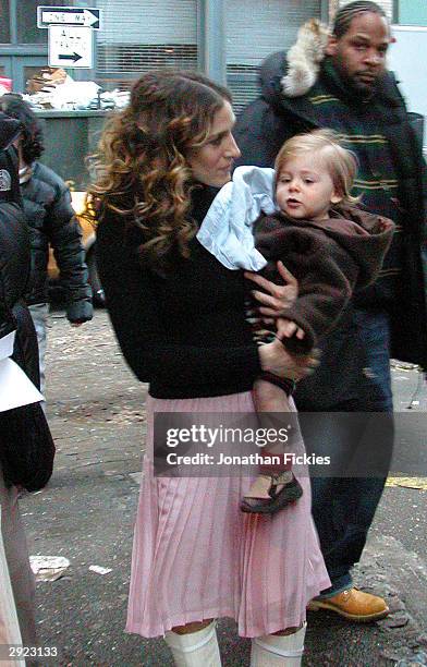 Actress Sarah Jessica Parker returns to her trailer with son James after filming a scene for 'Sex And The City' on February 02, 2004 in downtown New...