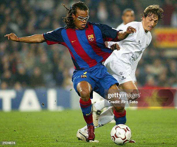 Edgar Davids of Barcelona and Mikel of Albacete in action during the La Liga match between FC Barcelona and Albacete played at the Nou Camp February...