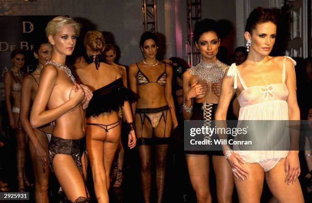 Sophie Anderton joins models wearing De Beers diamonds and La Perla lingerie are seen at the De Beers/La Perla charity fashion show to benefit Cancer...