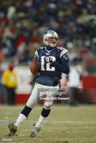 Quarterback Tom Brady of the New England Patriots drops back to throw during the game against the Tennessee Titans in the AFC divisional playoffs on...