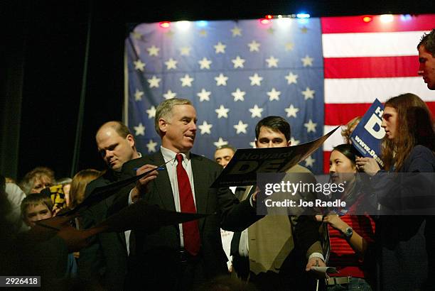 Democratic presidential candidate Howard Dean signs autographs after a campaign rally February 3, 2004 in Tacoma, Washington. The former Vermont...