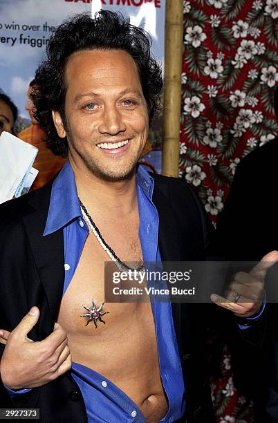 Actor Rob Schneider arrives at the premiere of "50 First Dates" at the Mann Village on February 03, 2004 in Westwood, California.