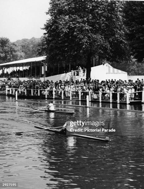 American rower J. W. Dietz of the New York Athletic Club leads P. G. R. Delafield of the Tideway Scullers School during the finish of the Diamond...