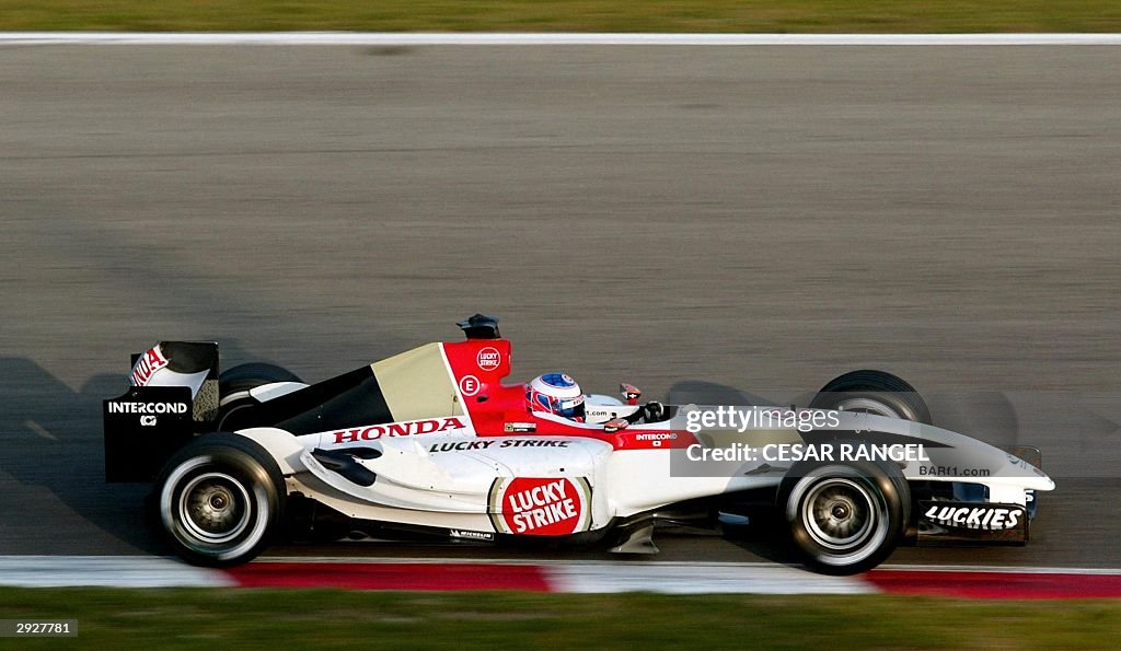 Button Racing Driver Honda driver Jenson Button races during a training session at the ...
