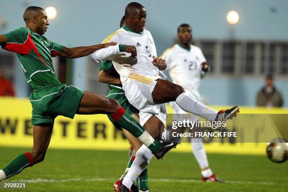 South Africa's Nhleko Nkosinathi (R) fig South Africa's Nhleko Nkosinathi (R) fig
