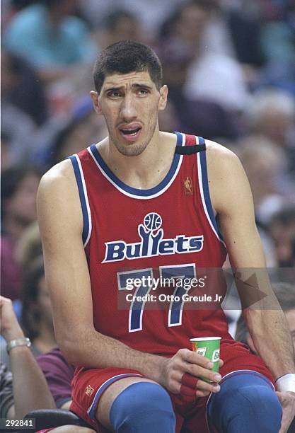 Center Gheorghe Muresan of the Washington Bullets sits on the bench during a game against the Sacramento Kings at the Arco Arena in Sacramento,...