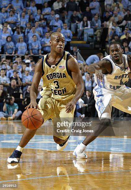 Jarrett Jack of the Georgia Tech Yellow Jackets moves the ball during the game against the Universtiy of North Carolina Tar Heels on January 11, 2004...